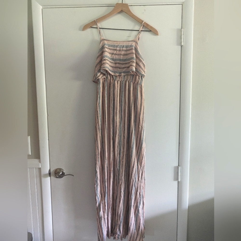 Long dress, size small.  Peachy pink, black and white with lining to knees.